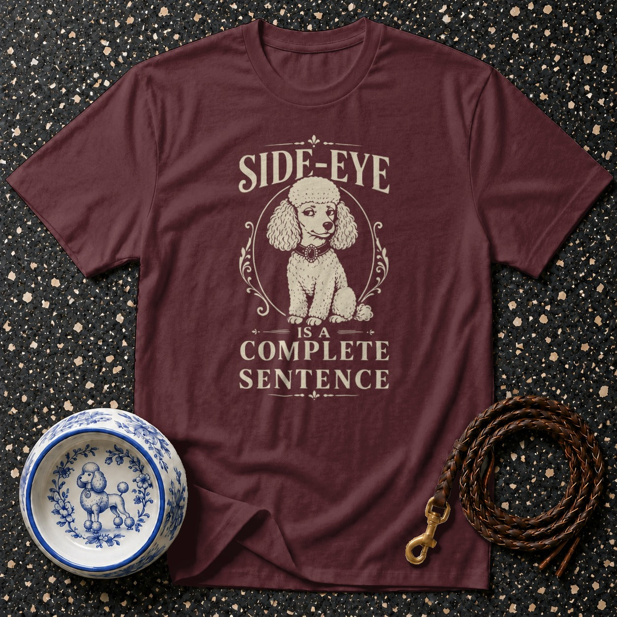 Maroon t-shirt with a poodle graphic and "SIDE-EYE IS A COMPLETE SENTENCE" text.