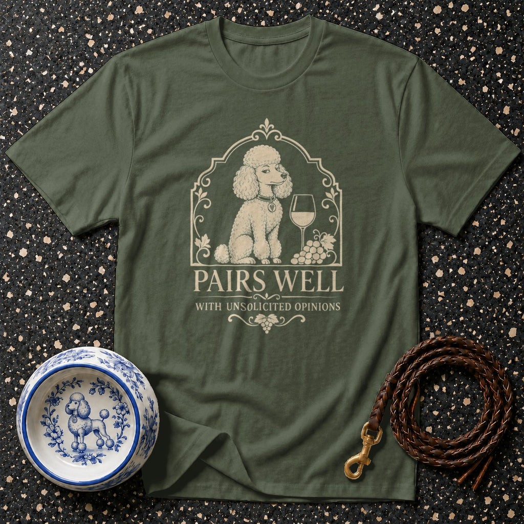 Olive t-shirt with poodle, wine glass, grapes and text "Pairs Well With Unsolicited Opinions".