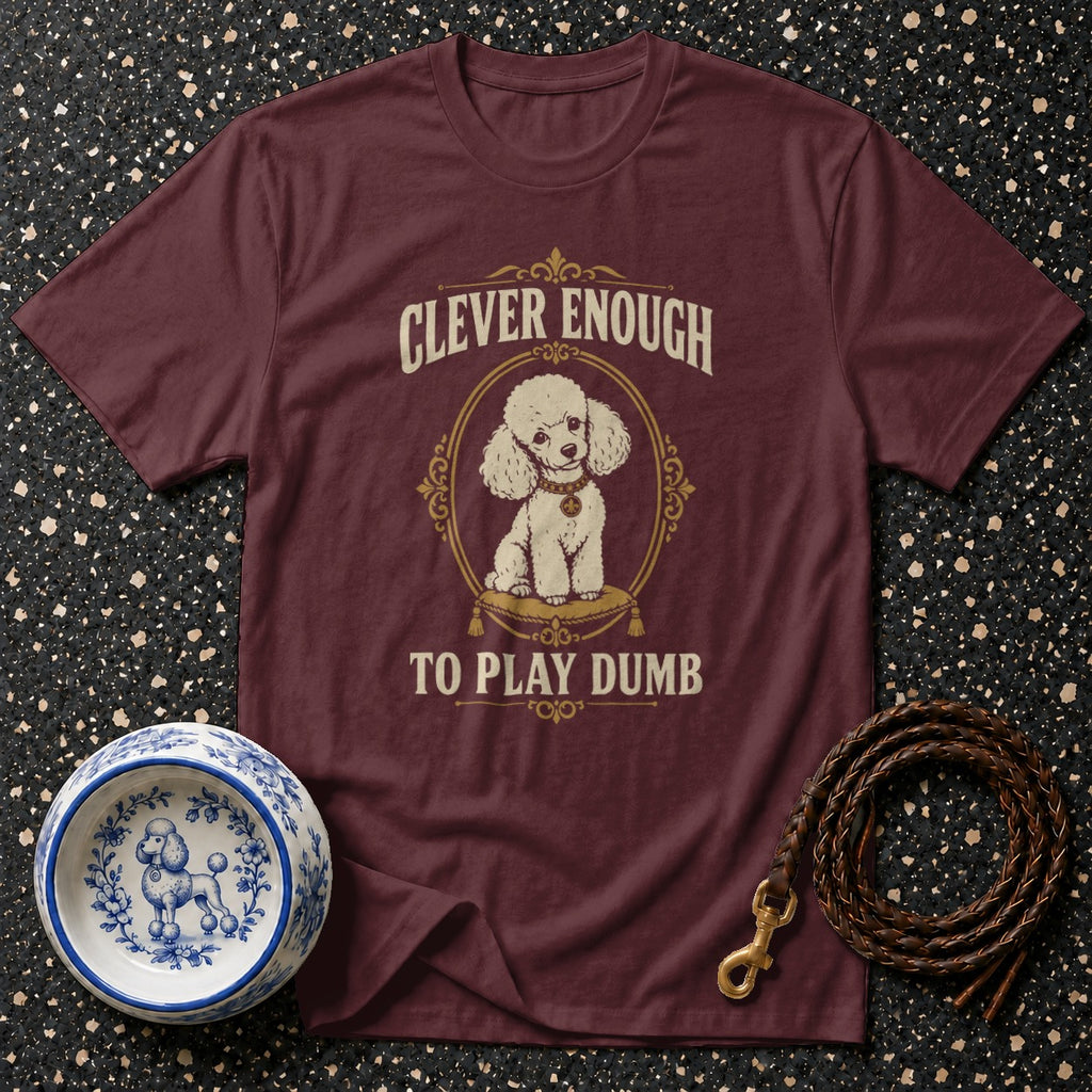 Burgundy t-shirt with white poodle illustration and text "Clever enough to play dumb".
