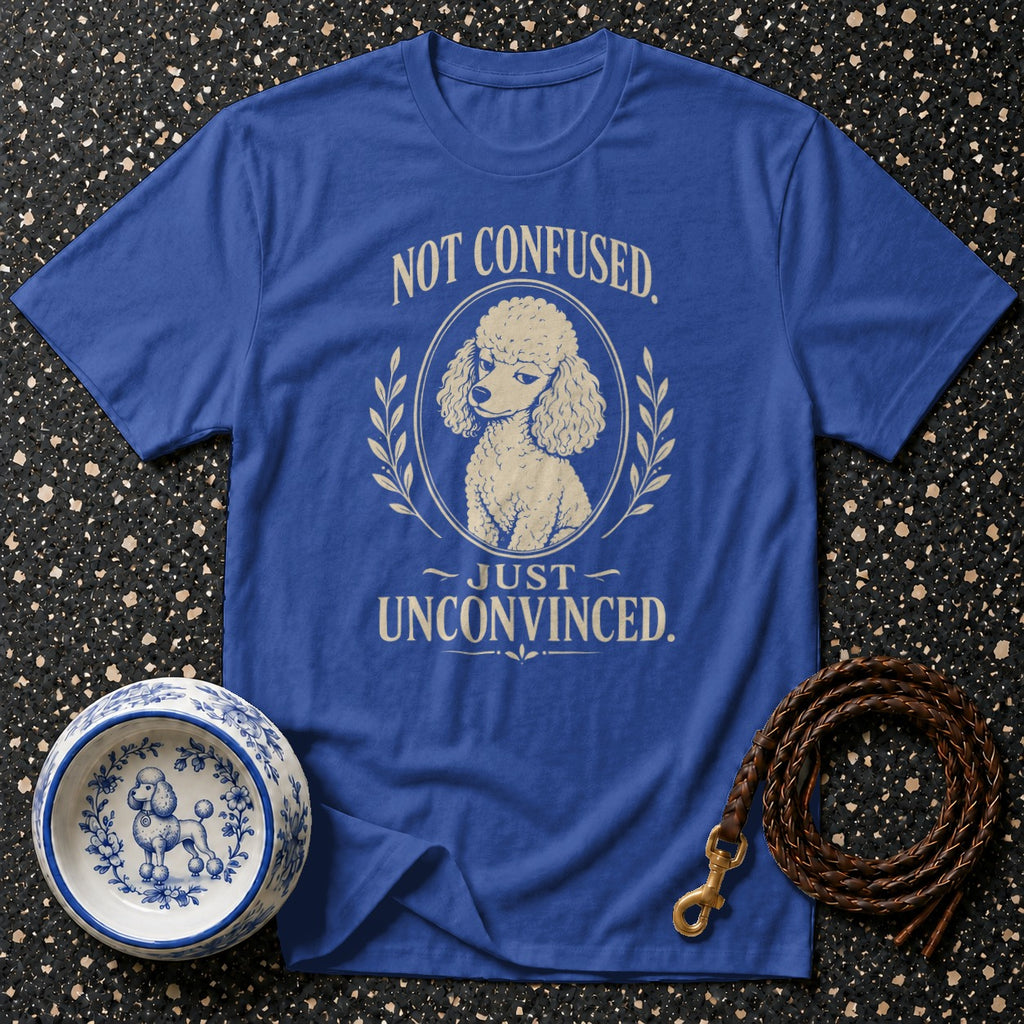 Blue t-shirt with poodle graphic and text "Not Confused. Just Unconvinced."