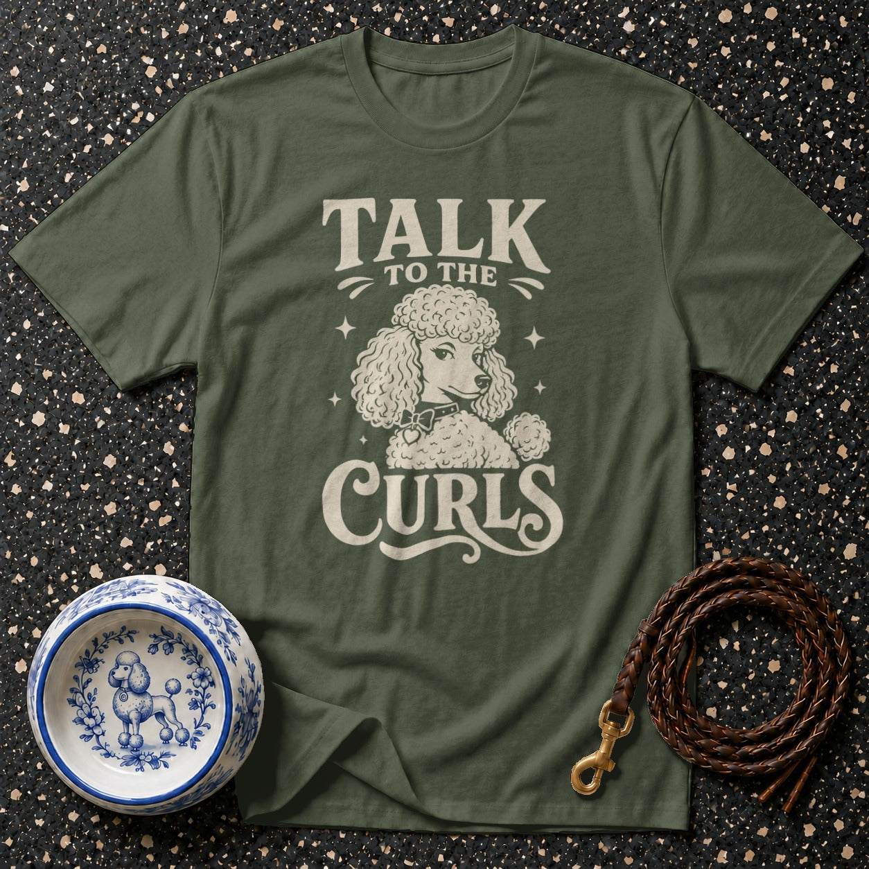 Green t-shirt with "Talk to the Curls" and a poodle graphic.