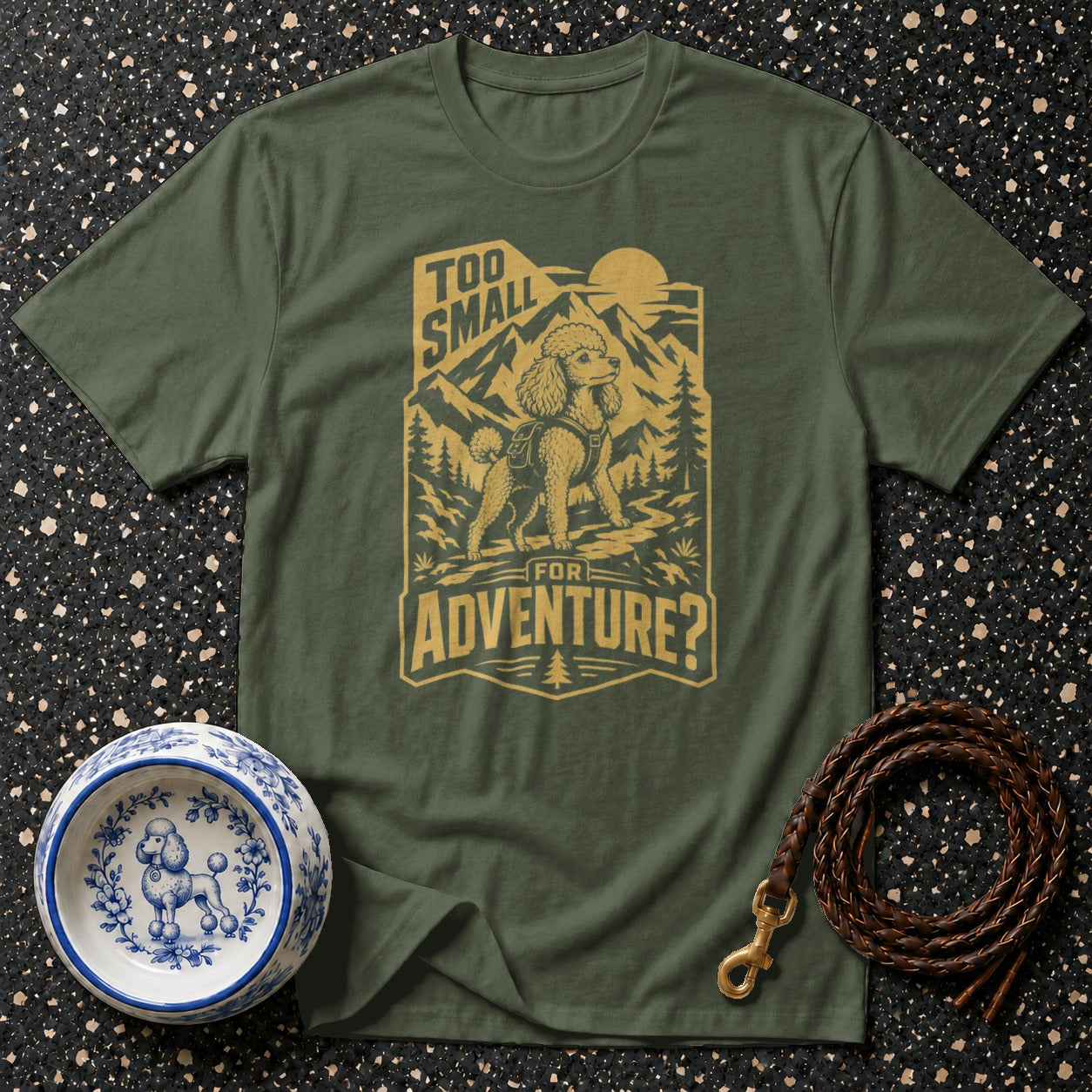 Green t-shirt with a poodle graphic saying "Too Small For Adventure?"