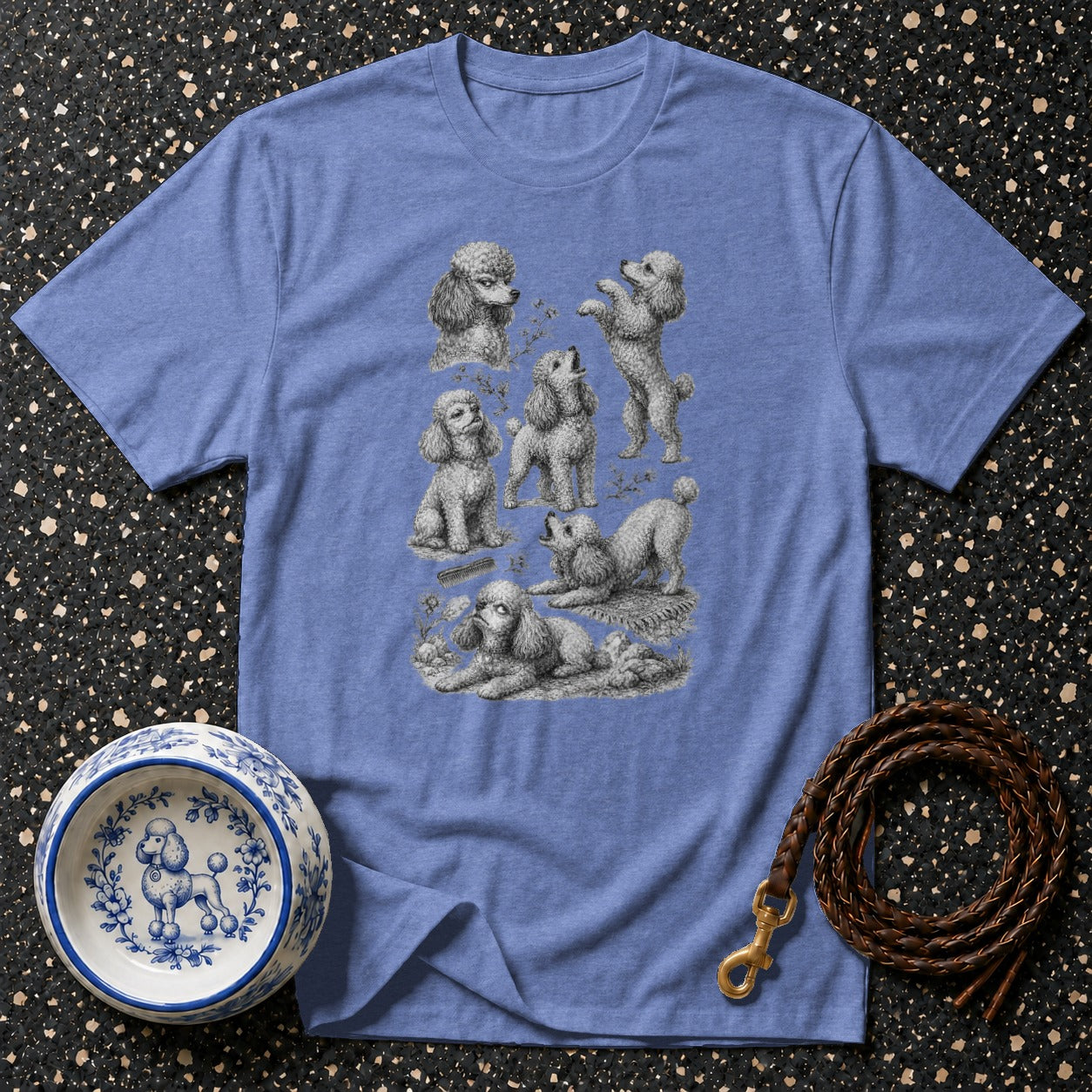 Slate blue t-shirt with vintage poodle illustration, a decorative bowl, and leather leash.