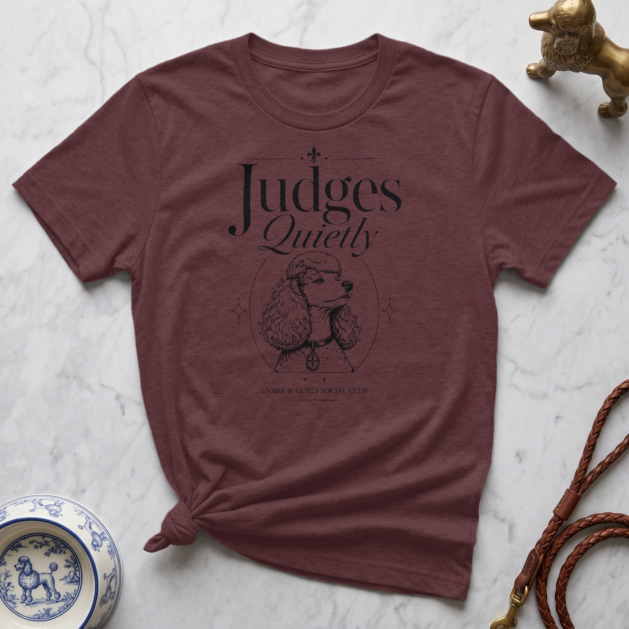 Maroon t-shirt with "Judges Quietly" and a poodle illustration.