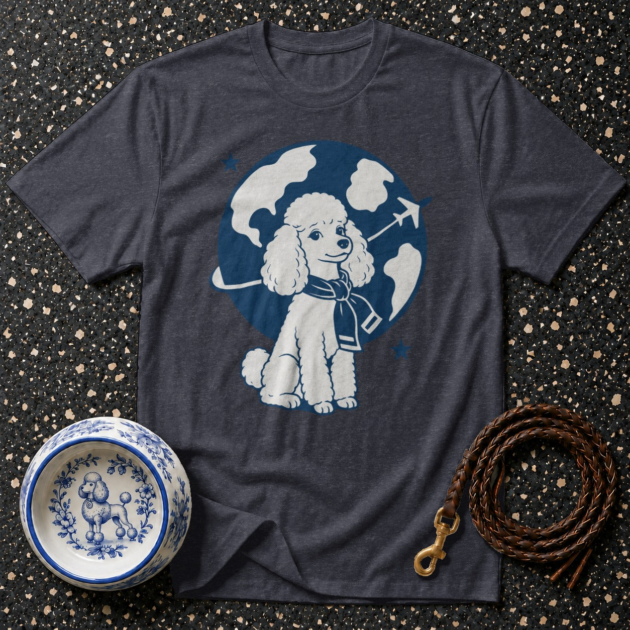 Dark gray t-shirt with white poodle graphic wearing a scarf against a blue globe.