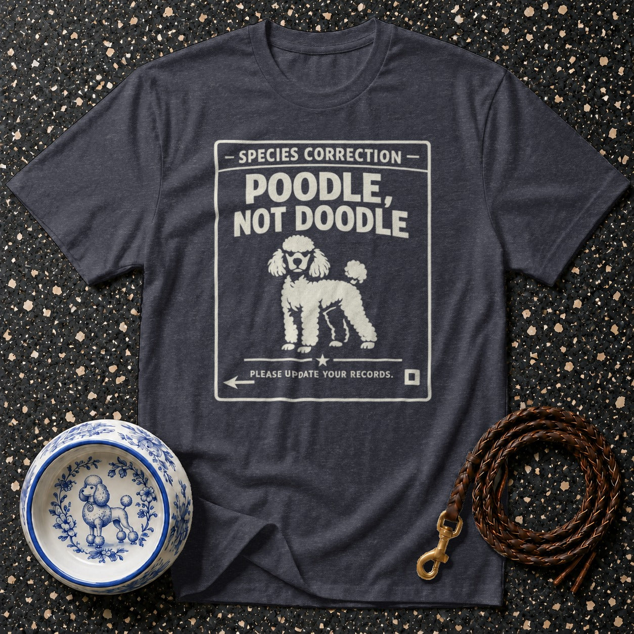 Dark t-shirt with "Poodle, Not Doodle" text and poodle illustration.