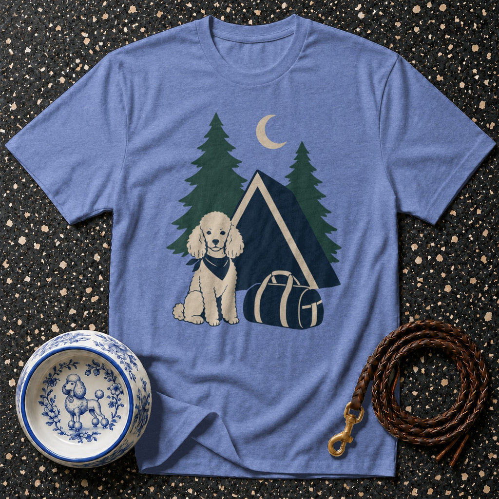 Light blue t-shirt with a cartoon poodle, tent, trees, and moon graphic.