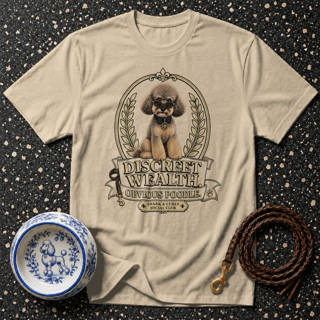 T-shirt with a poodle graphic and text "Discreet Wealth Obvious Poodle."