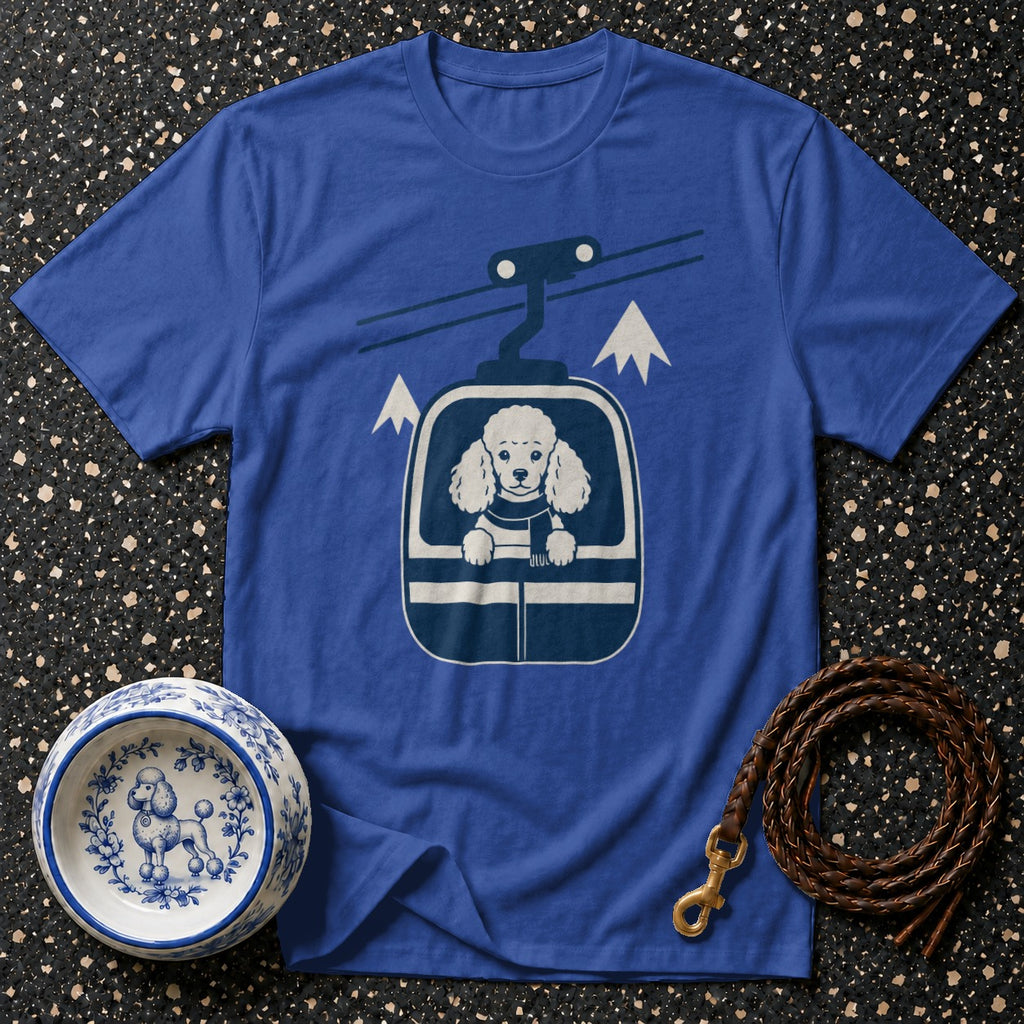 Blue t-shirt with white poodle in ski lift graphic and matching dog bowl.