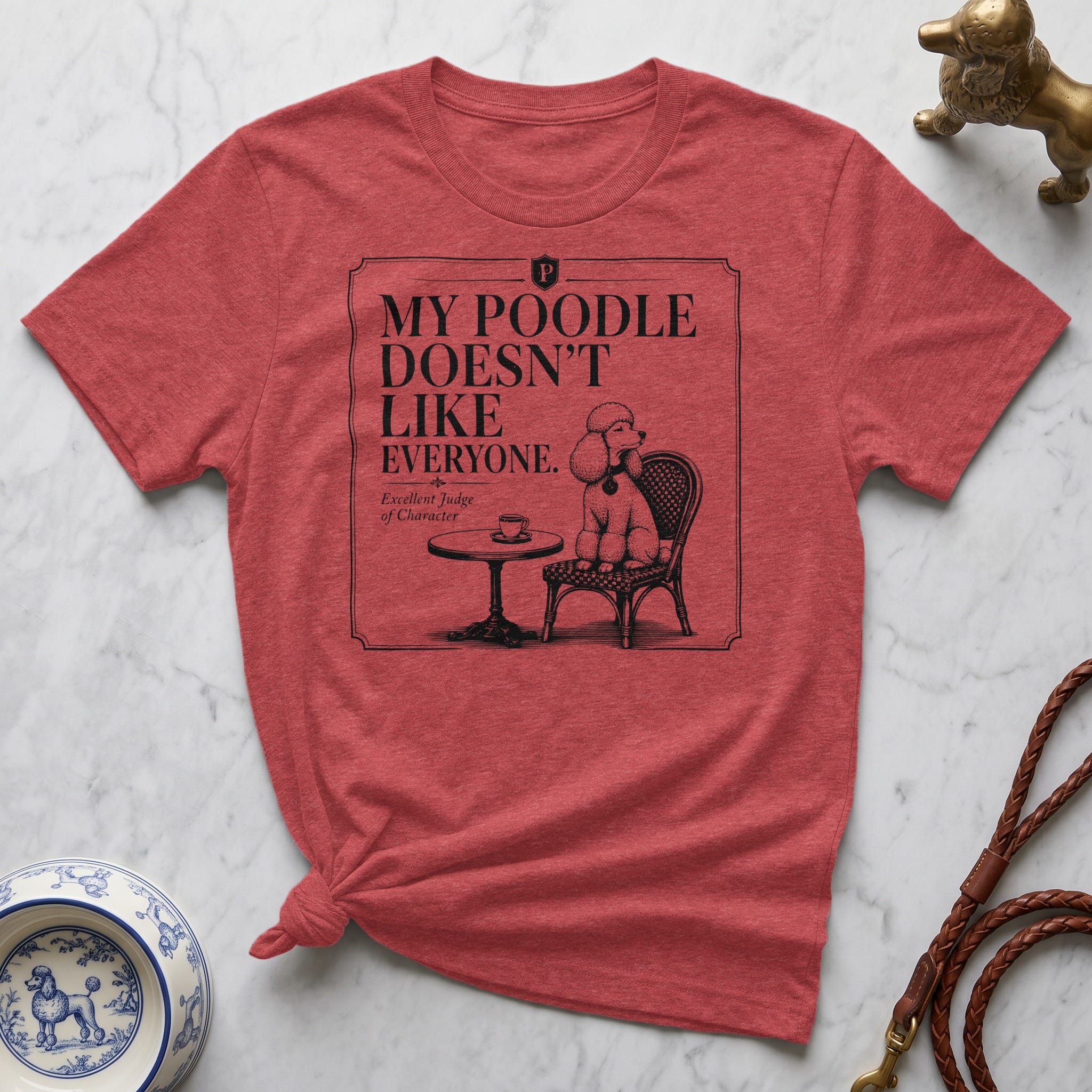 Red t-shirt with "My Poodle Doesn't Like Everyone." text and poodle illustration.