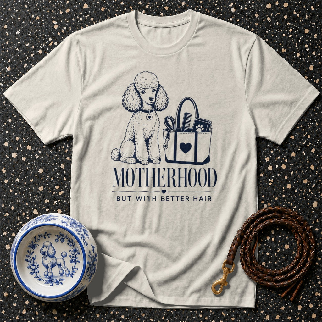 T-shirt with poodle illustration and text "MOTHERHOOD BUT WITH BETTER HAIR".