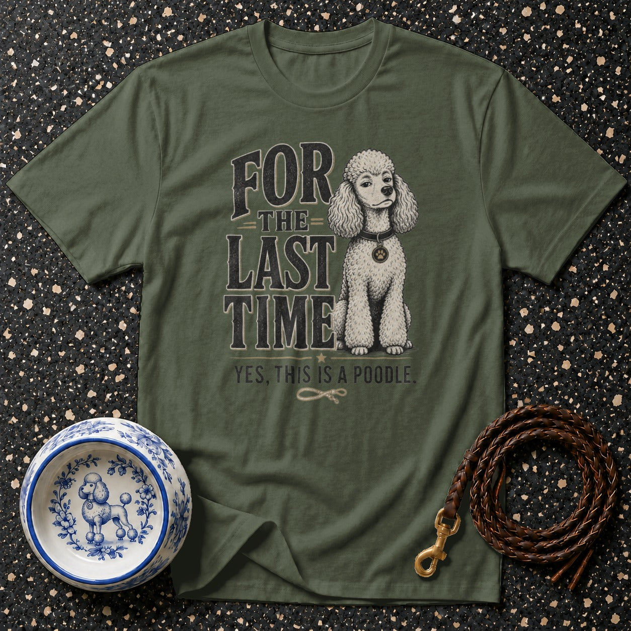 Green t-shirt with "For the Last Time, Yes, This is a Poodle" text and poodle graphic.