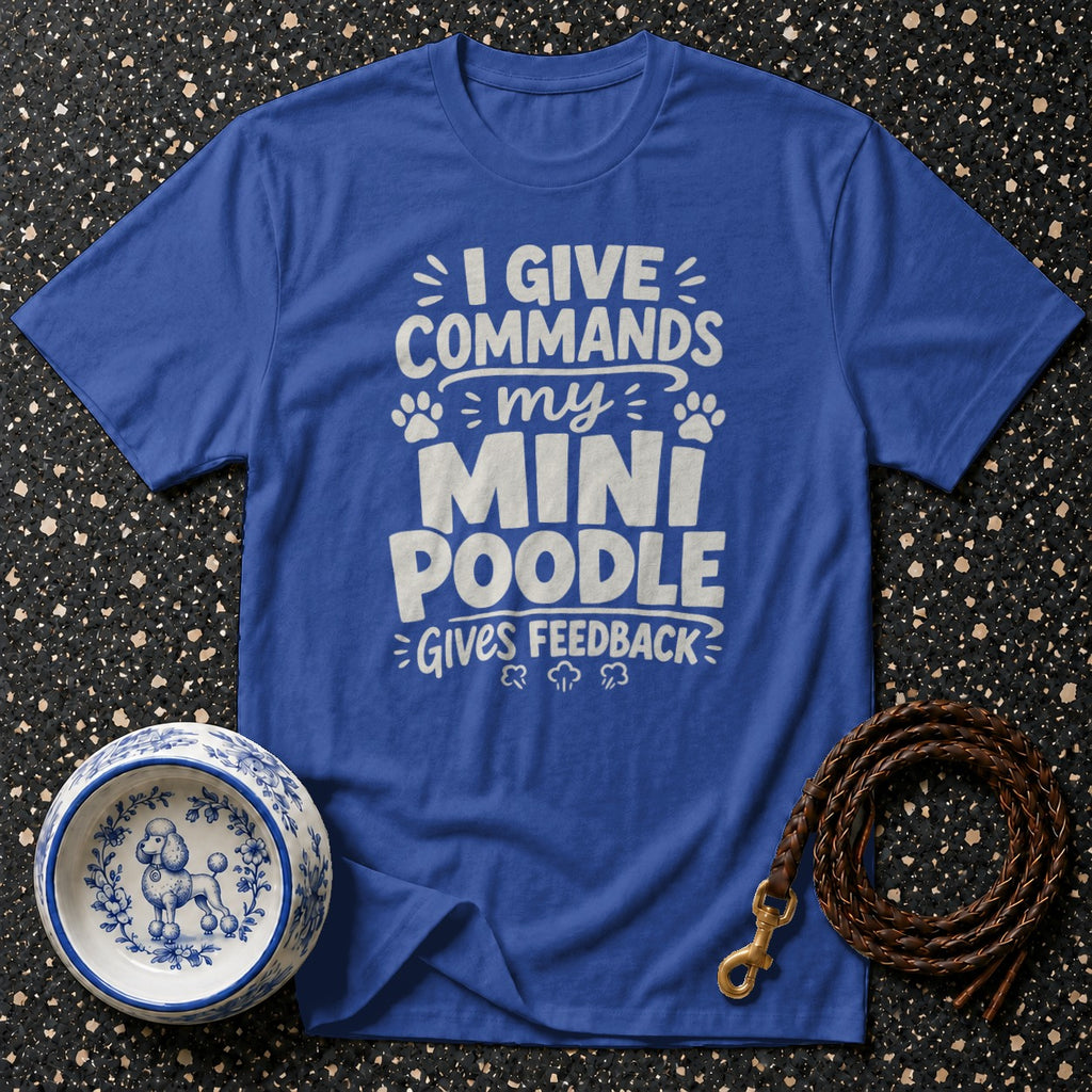 Royal blue t-shirt with white text "I GIVE COMMANDS my MINI POODLE GIVES FEEDBACK".