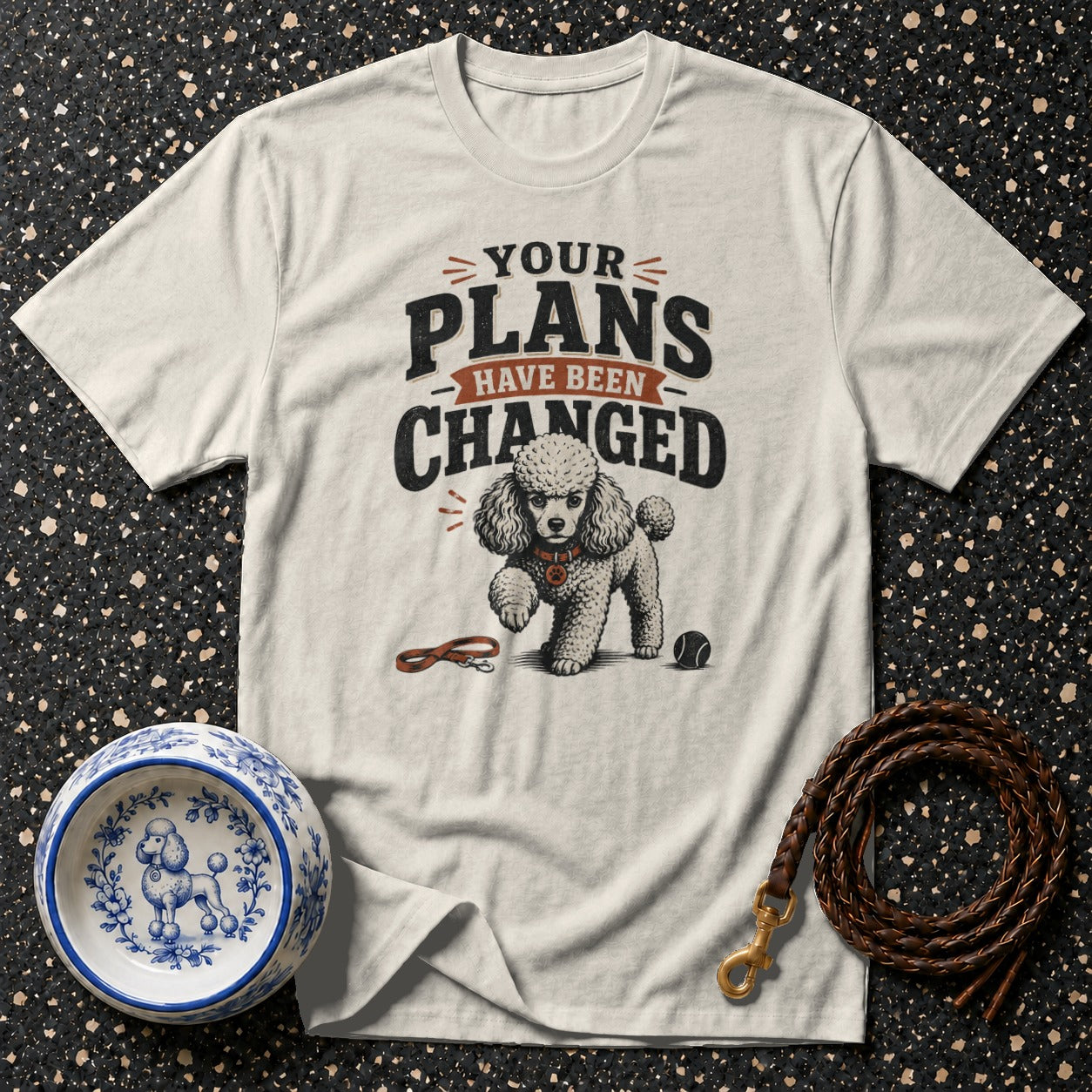 Light cream t-shirt with poodle and "Your Plans Have Been Changed" text.